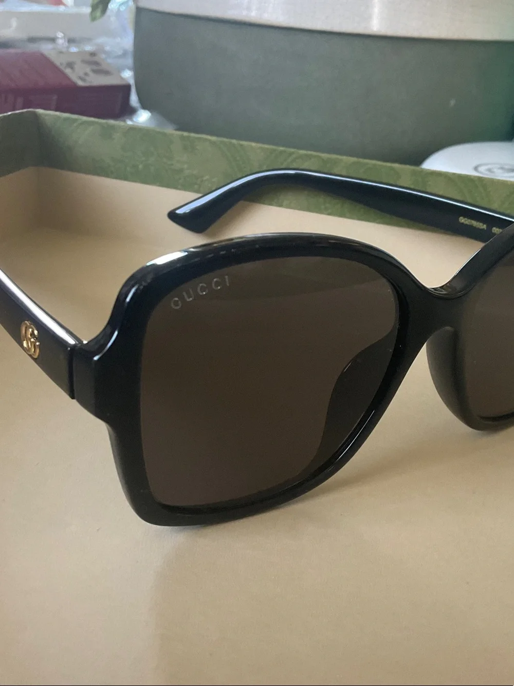 Gucci Black Gradient Butterfly Sunglasses with Gold Logo Accent